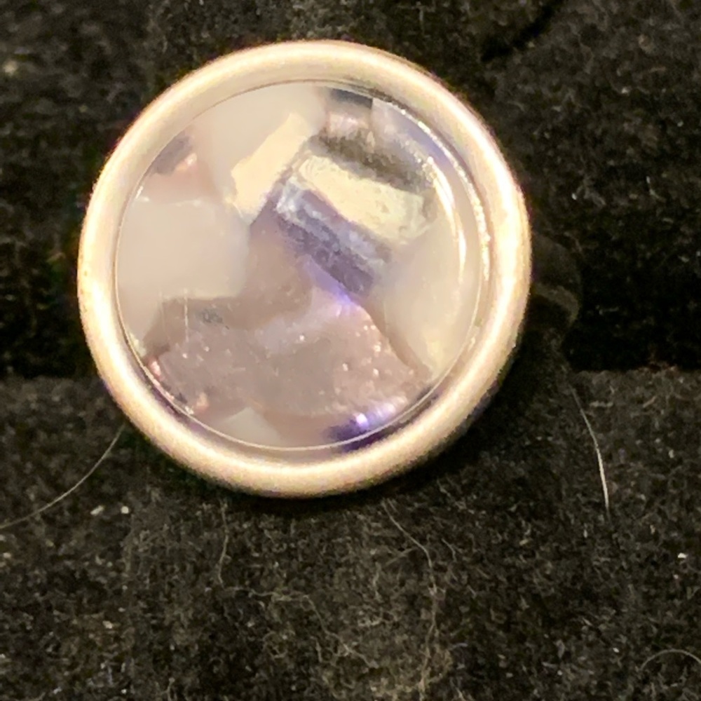 Silver tone ring with resin swirl